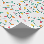 Kerstverlichting op witte achtergrond cadeaupapier (Hoek)