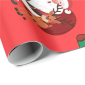 Kerstverpakkings papier met leuke Kerstman en rend (Rol Hoek)