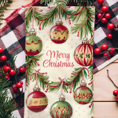 Kerstversiering en dennentakken theedoek