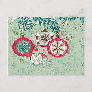 Kerstversieringen met een rode en blauwe retro feestdagenkaart