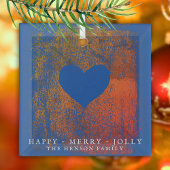 kerstviering met artistiek blauw hart glas ornament