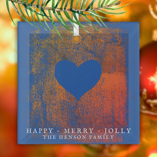 kerstviering met artistiek blauw hart glas ornament