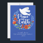 Kerstvrede op aarde Vakantiefotokaart Feestdagenkaart<br><div class="desc">Een mooie kerstkaart met een duif in een bloemenkrans en de woorden vrede op aarde. De kerstkaart is ontworpen in koningsblauw,  wit en rood. Personaliseer hem met je naam,  het jaar en je familie foto op de achterkant van de kaart. Ontworpen voor jou door Blackberry Boulevard.</div>