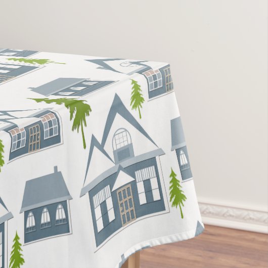 Kerstwinter afbeelding grijze huizen groene bomen tafelkleed (Voorbeeld)