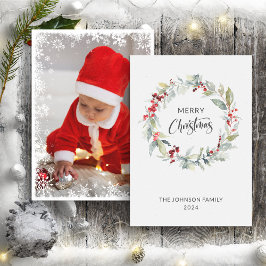 Kerstwinter krans van rode bessen Foto Feestdagenkaart