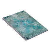 Kerstwinterwitte sneeuwvlokken op blauw notitieboek (Rechterzijde)