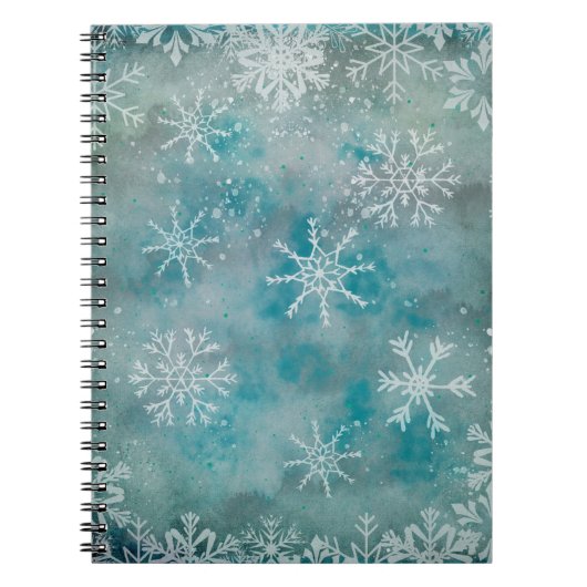 Kerstwinterwitte sneeuwvlokken op blauw notitieboek (Voorkant)