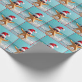 Kerstzeester in het water van de oceaan cadeaupapier (Hoek)