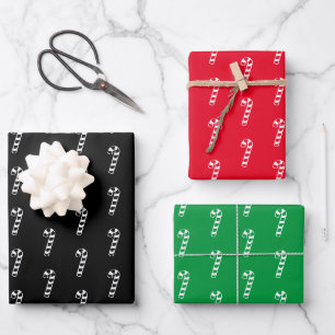Kerstzwart wit rood snoepgoed inpakpapier vel