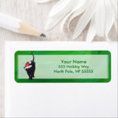 Kerstzwarte kat op groen etiket (Insitu)