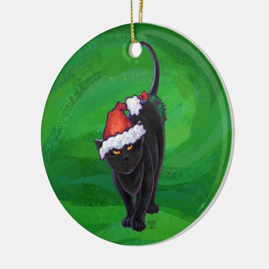 Kerstzwarte kat op groen keramisch ornament (Links)