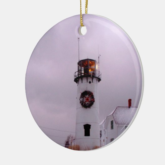 Ketsenvuurtoren in de sneeuw keramisch ornament (Links)