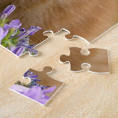 Keukenginger kitten in een tuin- legpuzzel (Zijkant)