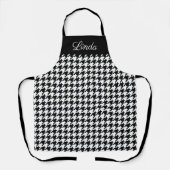 Keukenkeuken met een zwart en wit houndstooth-patr schort (Voorkant)