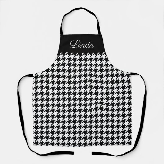 Keukenkeuken met een zwart en wit houndstooth-patr schort (Voorkant)