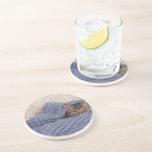 Keuten in een deken zandsteen onderzetter