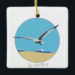 Key West, Florida Zee Gull boven het strand Keramisch Ornament<br><div class="desc">Keramisch ornament met een 2-dimensionaal zeeen meeuw afbeelding dat met golven over het strand vliegt. Key West, Florida in het script onderaan.</div>