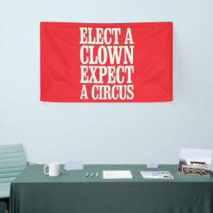 Kies een clown en verwacht een circus tegen Trump Spandoek