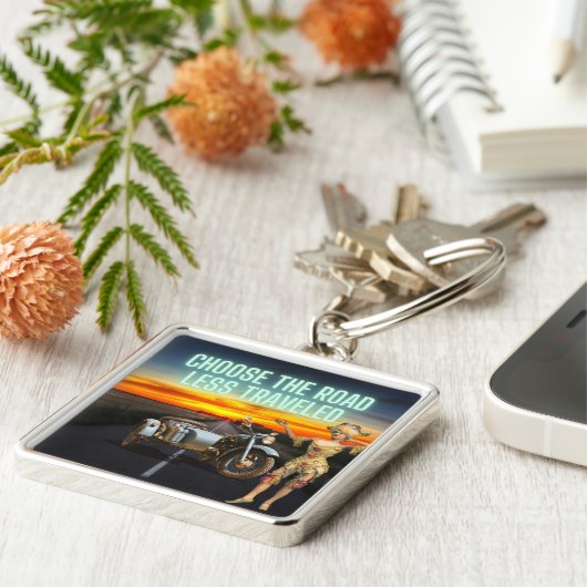 Kies voor de weg die minder onderweg is, anders ge sleutelhanger (Zijkant)