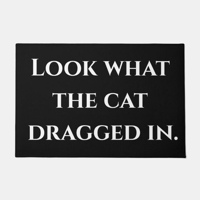 Kijk wat de kat erin sleepte. deurmat (Voorkant)