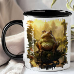 Kikker door Morning Pond Reflection Mok<br><div class="desc">Begin je dag met de rustige schoonheid van de Frog by Morning Pond Reflection Mok. Deze charmante mok beschikt over een heerlijk afbeelding van een kikker gelegen door een serene vijver, met het vroege ochtendlicht en boslandschap prachtig weerspiegeld in het water. Gepersonaliseerd met jouw naam, voegt het een unieke en...</div>
