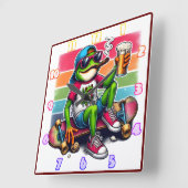 Kikker klaar om te feesten met een drink op een sk vierkante klok (Hoek)