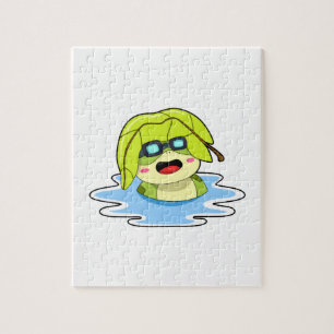 Kikker met leder tijdens zwemmen legpuzzel