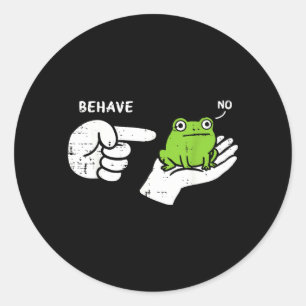 Kikker op hand gedraagt zich grappig meme cartoon ronde sticker