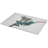 Kikker van de blauwe boom met oogbril op wit snijplank (Hoek)