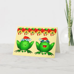 Kikkers met kerstmannenmutsen, bellen en vrolijke feestdagen kaart