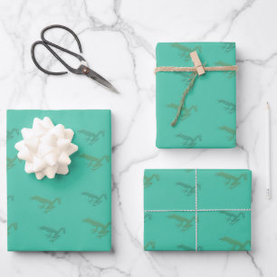 Kikkers op blauwgroen inpakpapier vel