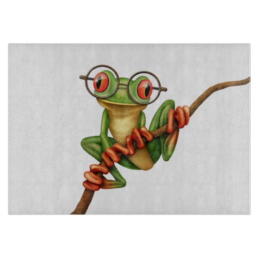 Kikte groene kikker met oogbril op wit snijplank (Voorkant)