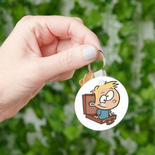 Kind in een Sleutelhanger in een koffer