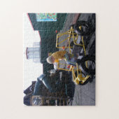 Kind stijgt op joodpuzzel op speelplaats legpuzzel (Verticaal)