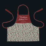 Kinder bloemmotief kerstbakbemanning | Naam Schort<br><div class="desc">Dit prachtige kerstpatroon heeft een handgetekend bloemmotief en groen schort in klassieke, traditionele kerstkleuren van diepgroen, bordeaux rood en ivoor op een zandbeige achtergrond. Eenvoudig, script typografie leest, "Christmas Baking Crew, " en een tekst sjabloon is opgenomen voor personalisatie! Volwassen maten (apart product) zijn ook beschikbaar voor bijpassend plezier! Stijlvol...</div>