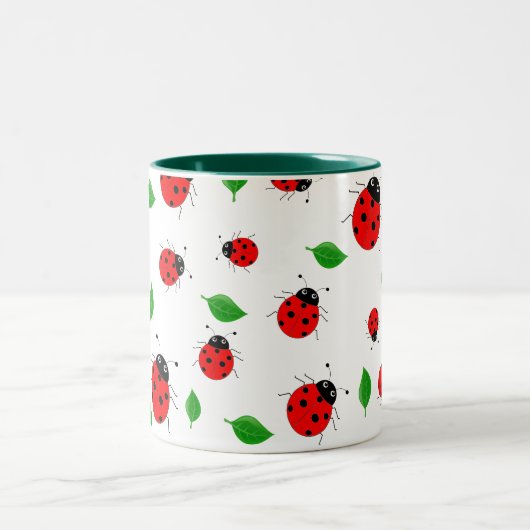 Kinder Cute Red ladybug en groen verlof op verloop Tweekleurige Koffiemok (Center)