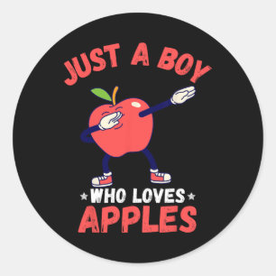 Kinder jongen die van appels houdt, geeft grappige ronde sticker