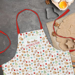 Kinder kerstfeestdag met kerstcadeau schort<br><div class="desc">Dit schattige "Cookie Monster" gepatterde vakantieoord-schort bevat feestelijk versierde kerstkoekjes met suiker in de vorm van sneeuwvlokken, sneeuwpoppen, kerstbomen, ornamenten en sterren. Geef dit jaar de naam van je favoriete koekjesmonster aan voor een mooi, aangepast cadeau (en een kans dat je ze ertoe aanzet nog meer koekjes voor iedereen te...</div>