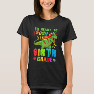 Kinder klaar om de zesde klas dinosaurus terug naa t-shirt
