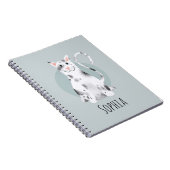 Kinder school voor meisjes met een moderne blauwe  notitieboek (Rechterzijde)