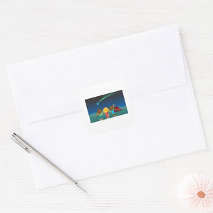 Kinderen die een Comet Square Sticker bekijken