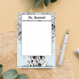 Kinderen die onder een boom lezen post-it® notes