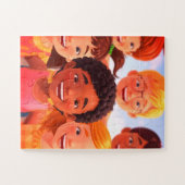 Kinderen die samen lol hebben met een puzzel van 3 (Horizontaal)