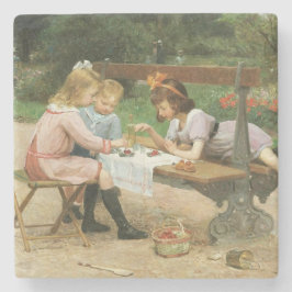 Kinderen die vanmiddag thee drinken in het park stenen onderzetter