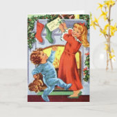 Kinderen in gefoodreerde pyjama's op kerstkussen kaart (Gele Bloem)