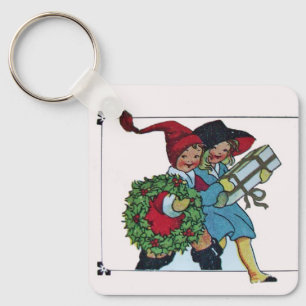 KINDEREN MET KERSTCADEAUS SLEUTELHANGER