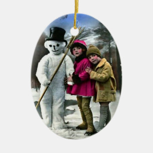 KINDEREN MET SNOWMAN KERAMISCH ORNAMENT
