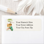 Kinderen onder de mistletoe met kerstmis etiket (Insitu)