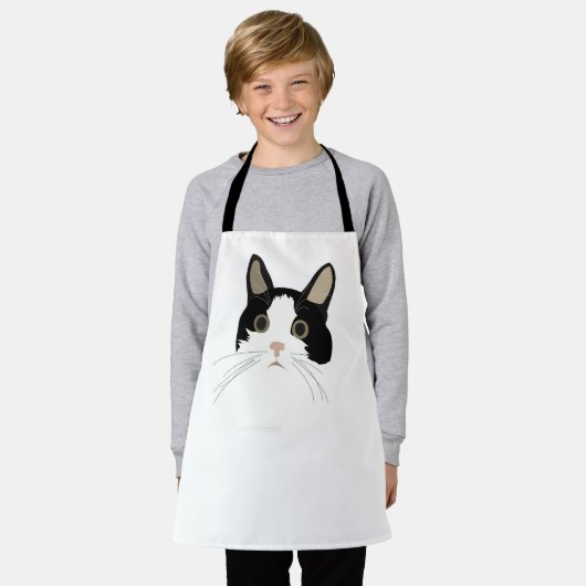 Kinderen van zwarte en witte kattenstaart schort (Gedragen)