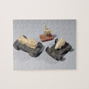 Kinderspeelgoed: een egel, een leeuw en een duif,  legpuzzel